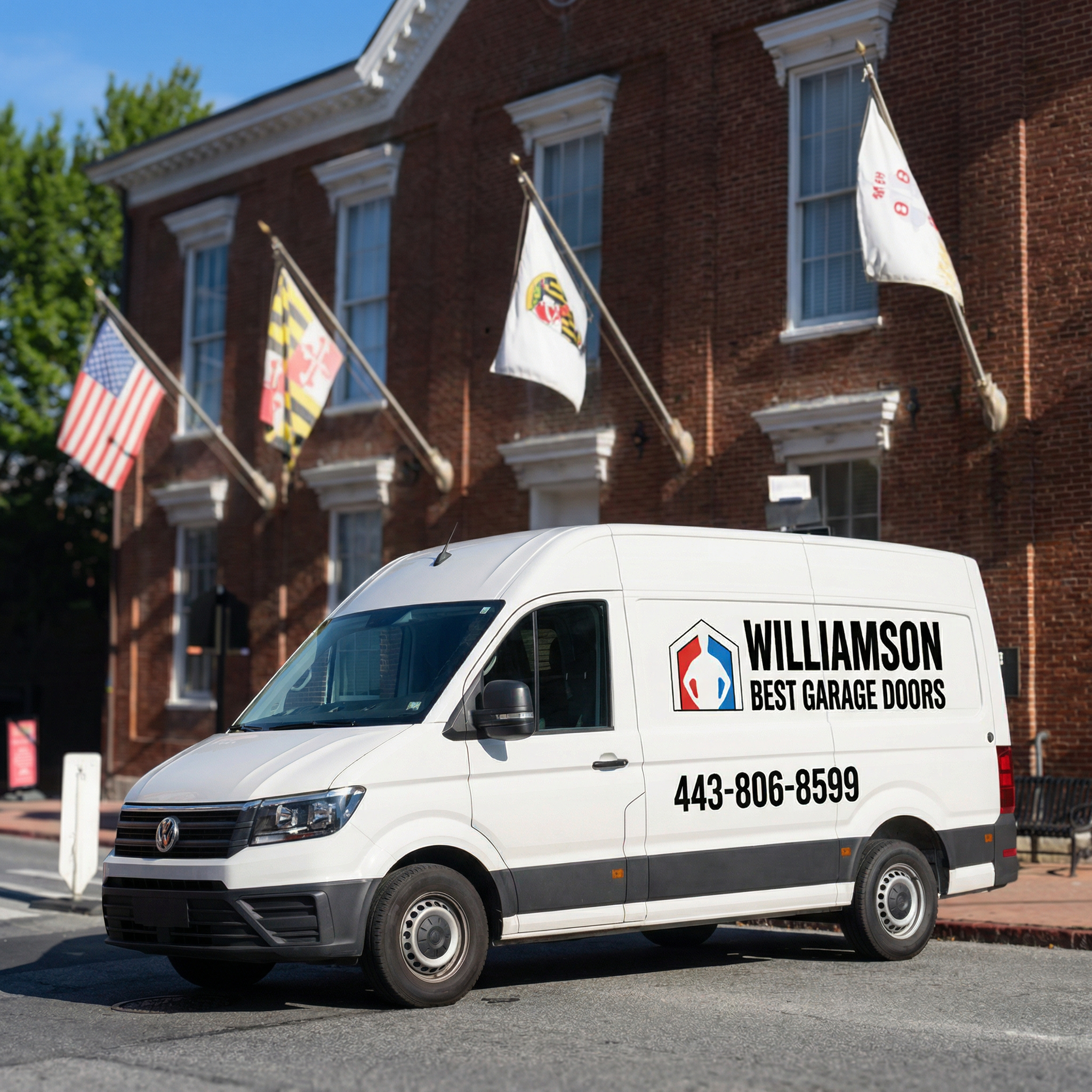 Williamson Best Garage Doors service truck parked in front of Annapolis City Hall on Duke of Gloucester Street.